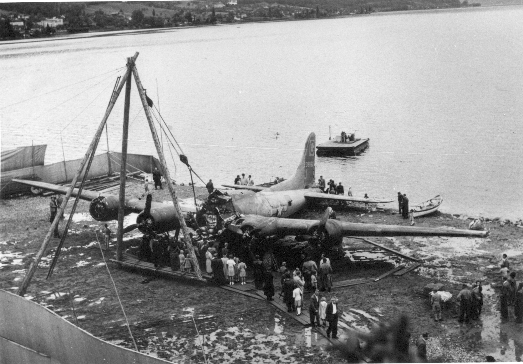 Plane being pulled out of river