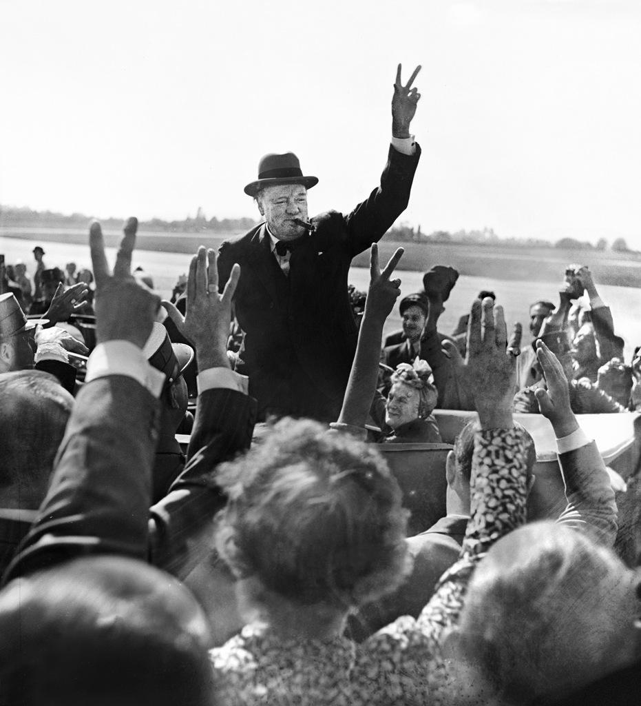 Winston Churchill is given a hero's welcome on his arrival in Geneva on August 23, 1946