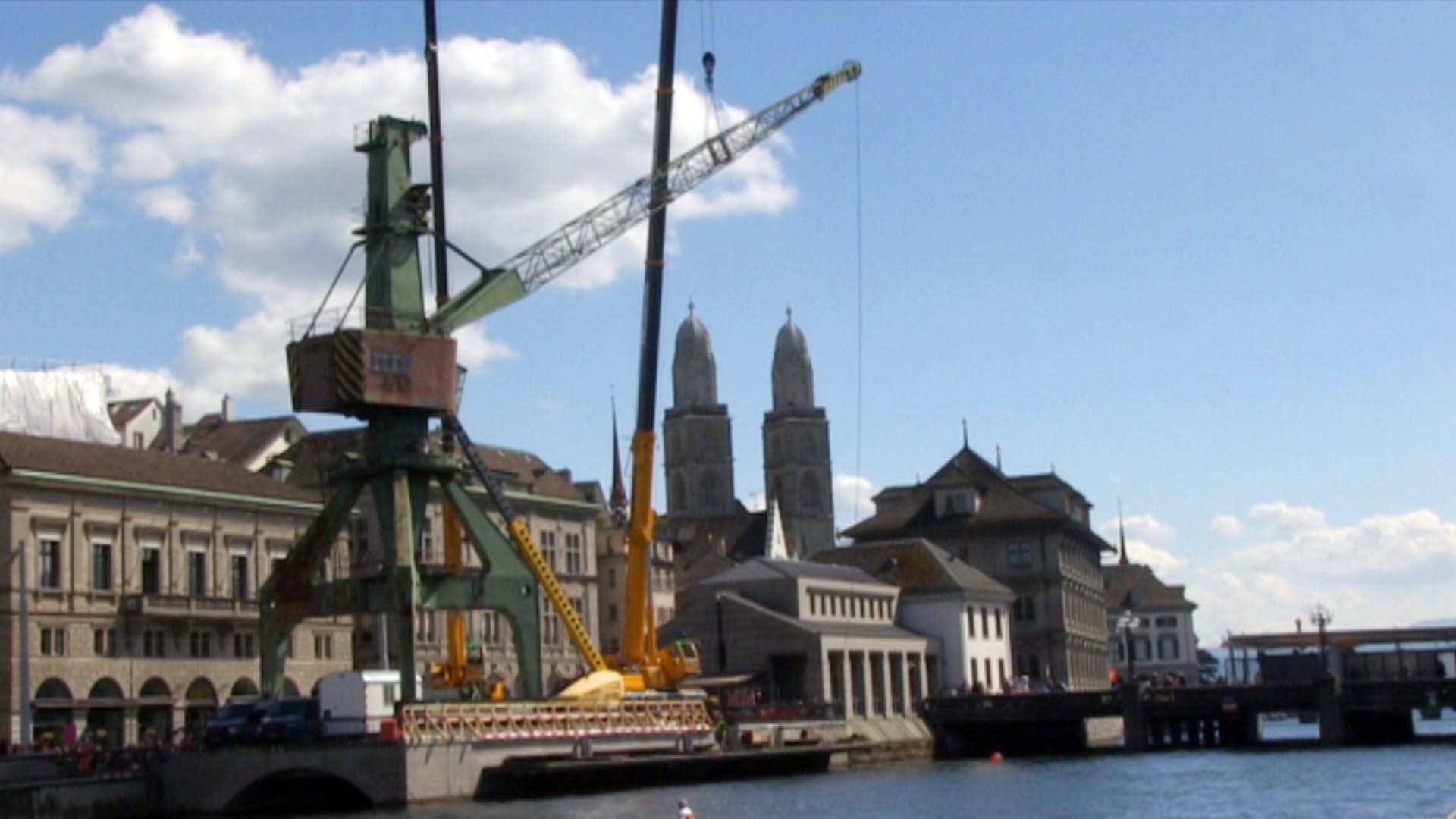 The harbour crane on the side of a river in Zurich