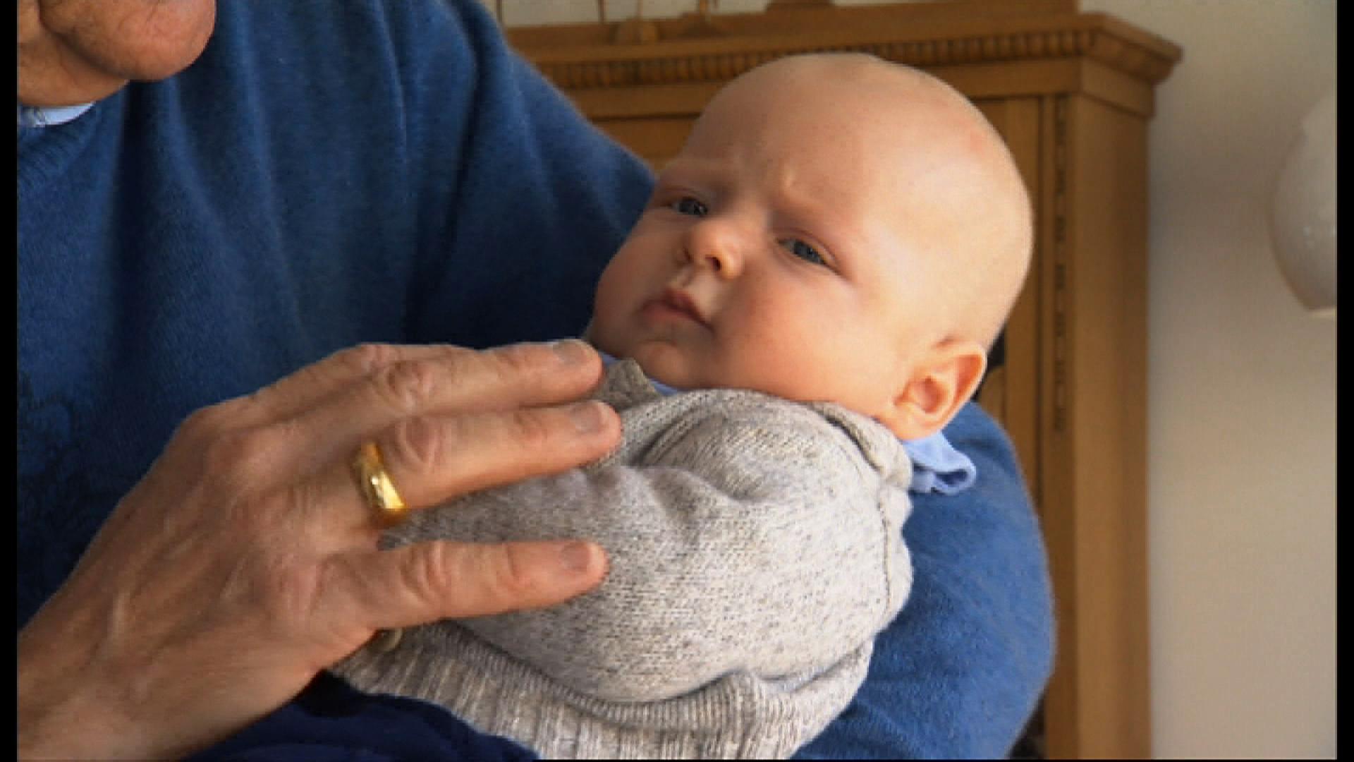 Ageing dad with infant