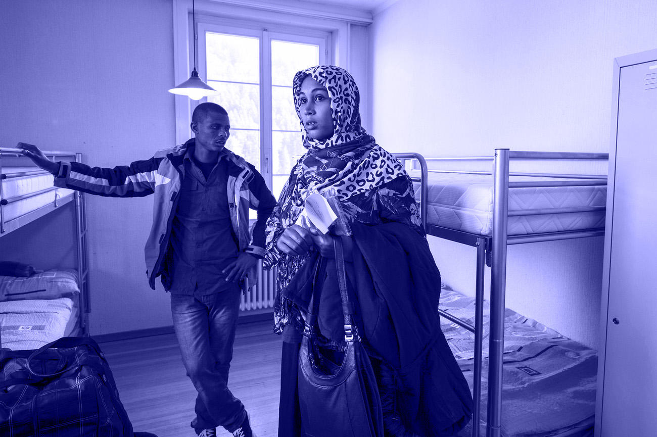 asylum seekers in a room at an asylum center in Emmental, 2014.