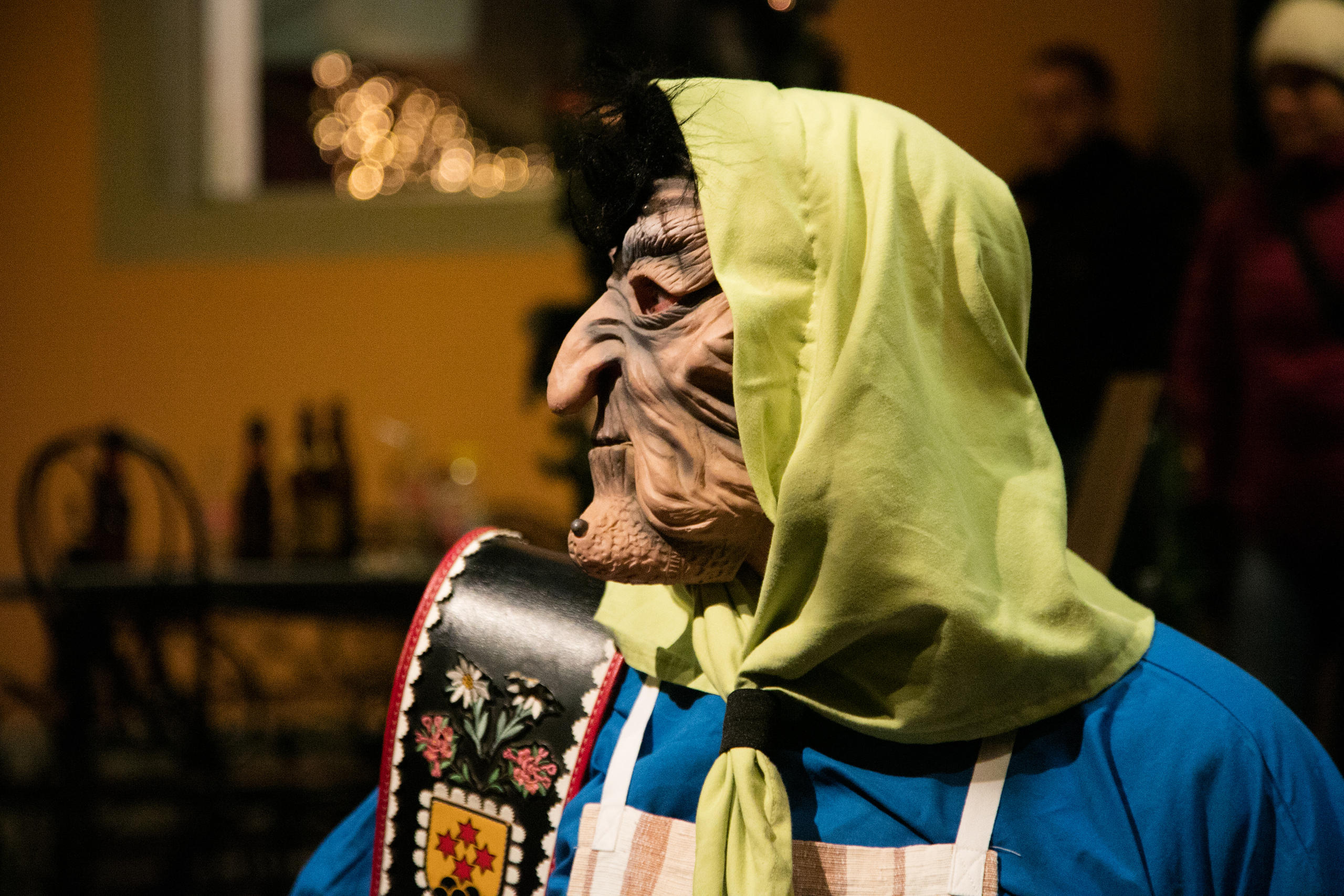 A witch's mask with the obligatory black wart.