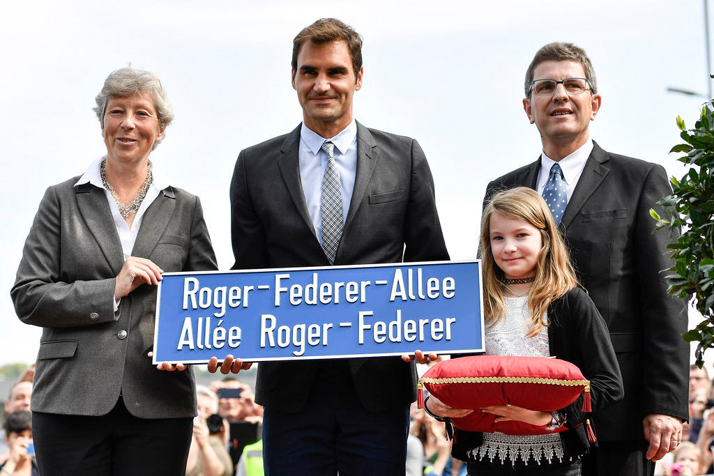 Federer with street sign named after him
