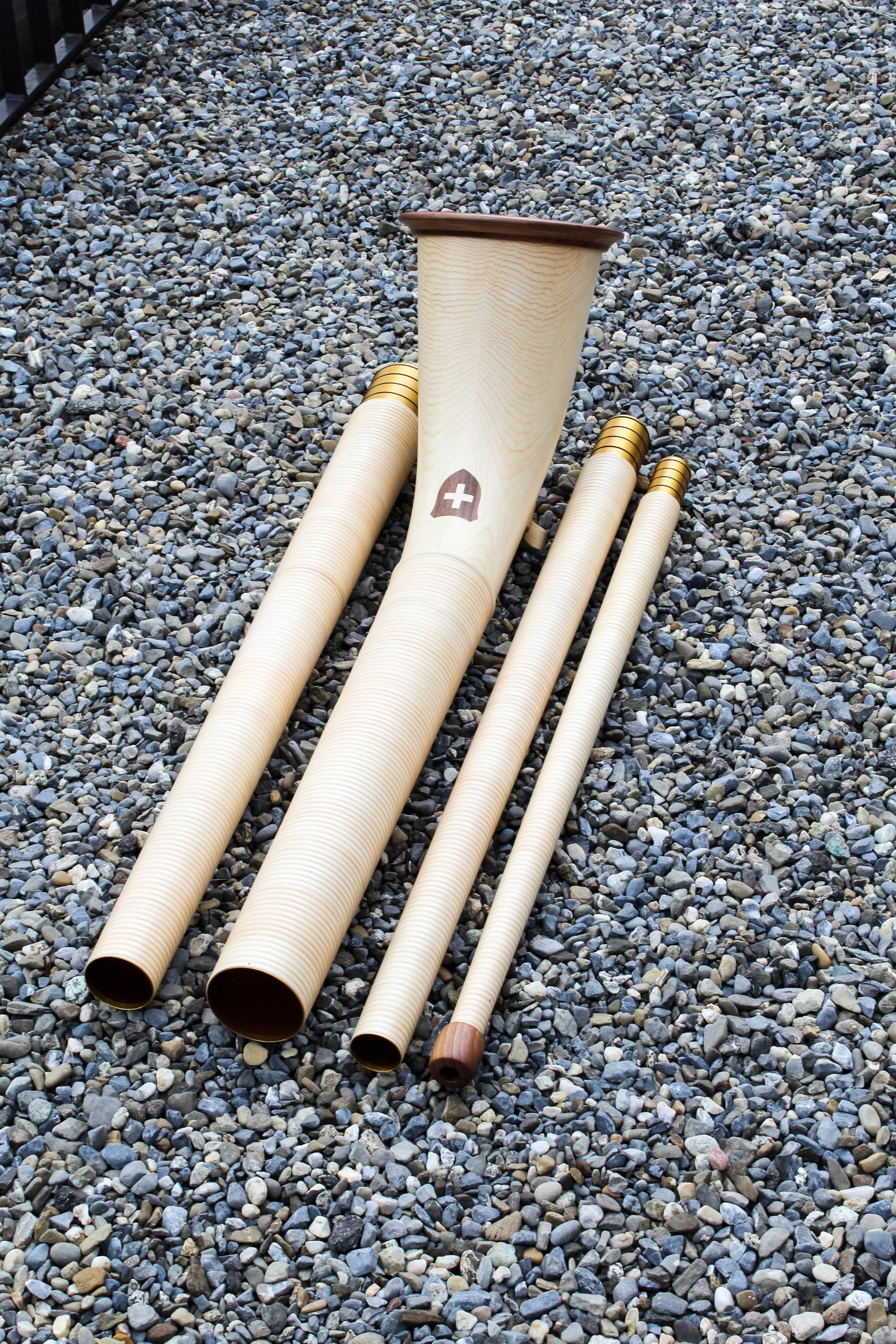 Thomas Eichenberger works on an Alphorn at his carpentry workshop in the canton of Lucerne.