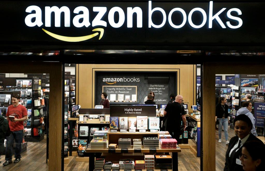 An Amazon bookstore with shelves filled with books and customers