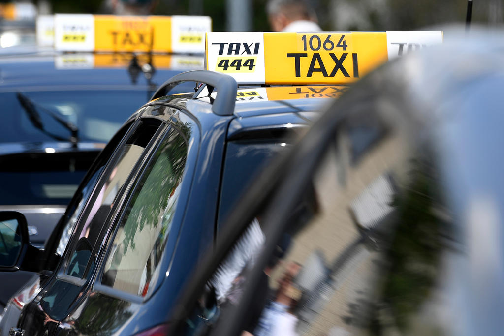 taxis go slow in Zurich to protest against uber