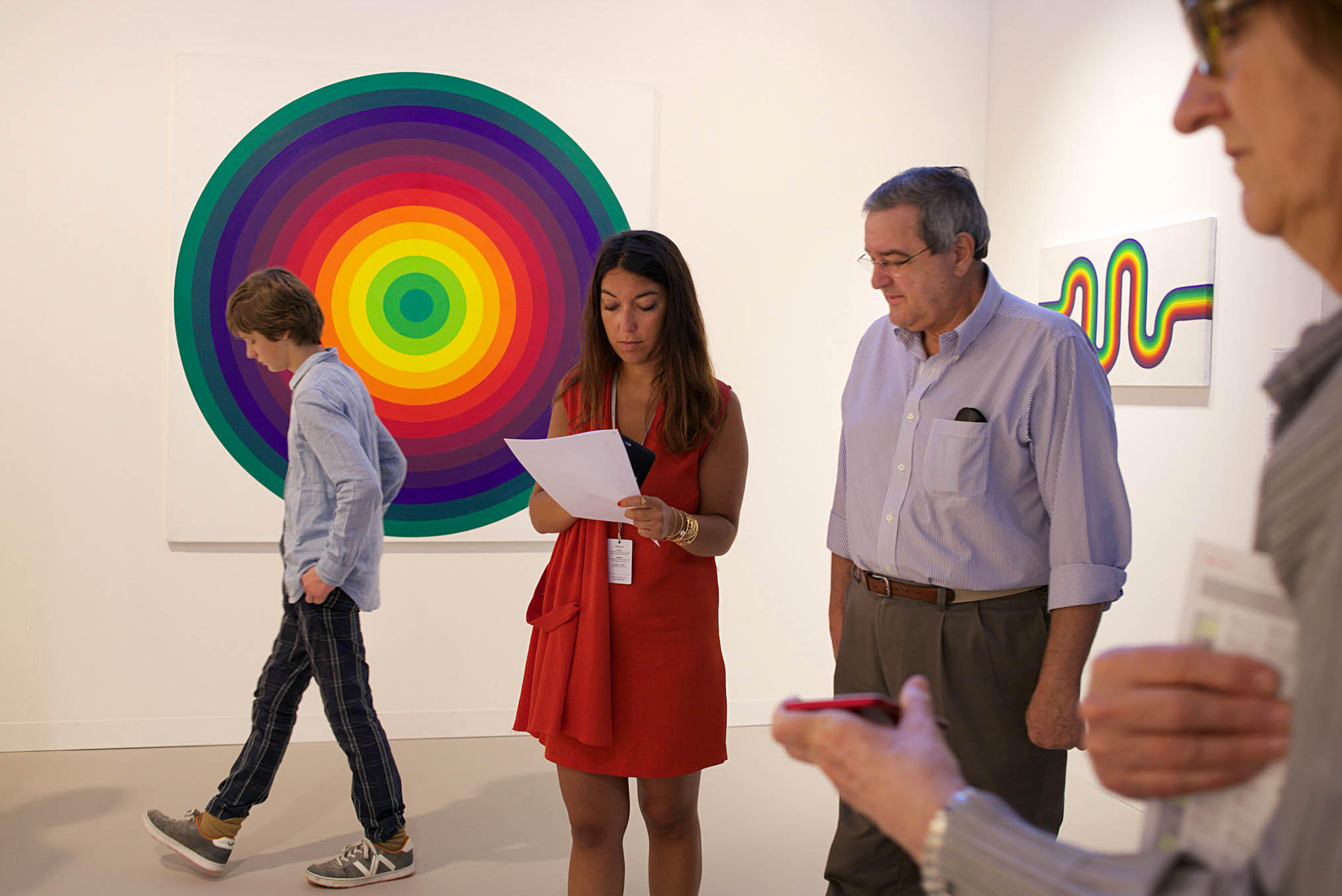 Visitors admiring contemporary works at the Art Basel 2017