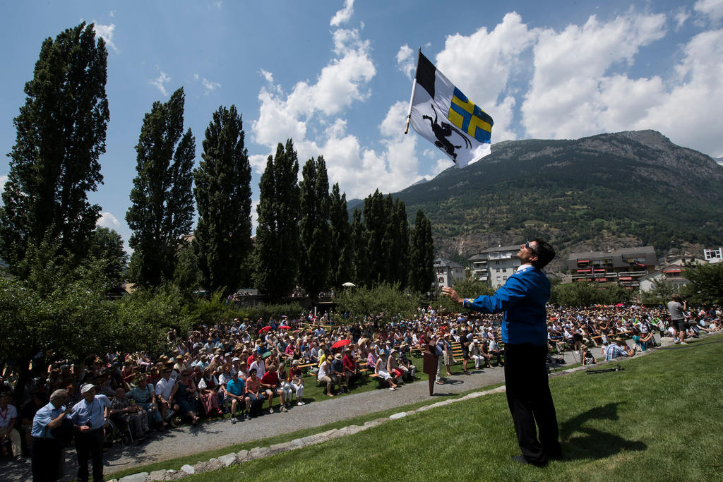 man throwing flag in the air