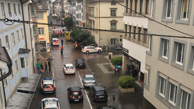 Police vehicles gather in the old town of Schaffhausen