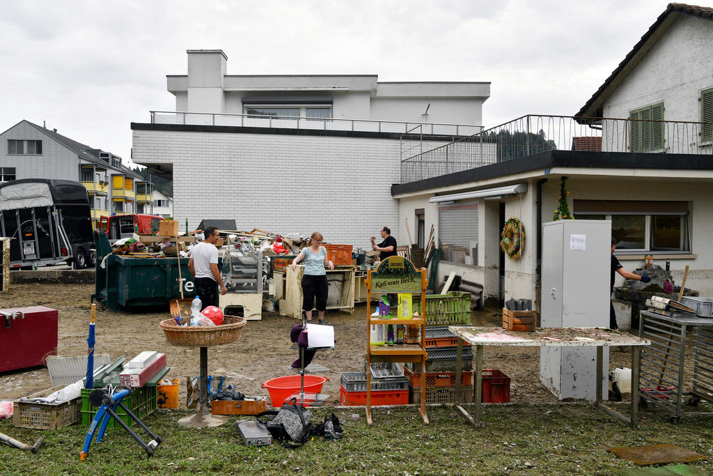 Junk from the storm damage around a house