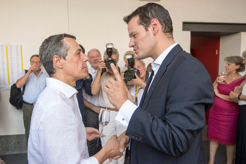 ignazio cassis and pierre maudet face off