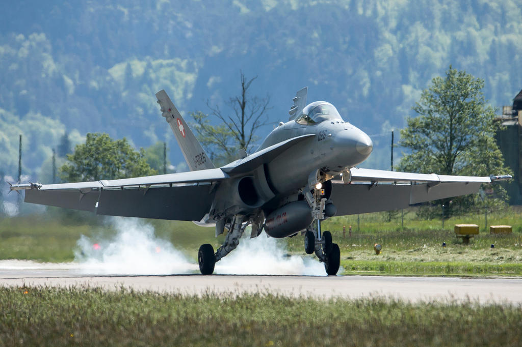 A F/A-18 fighter jet takes off