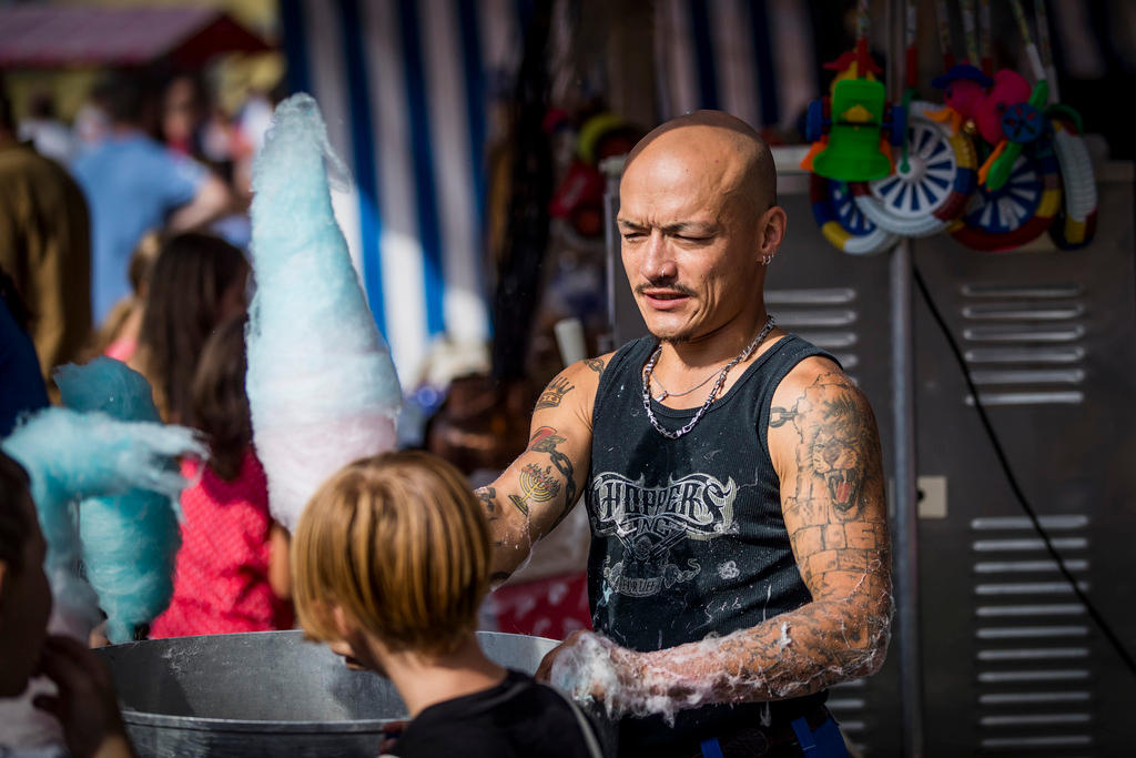 man selling candy floss