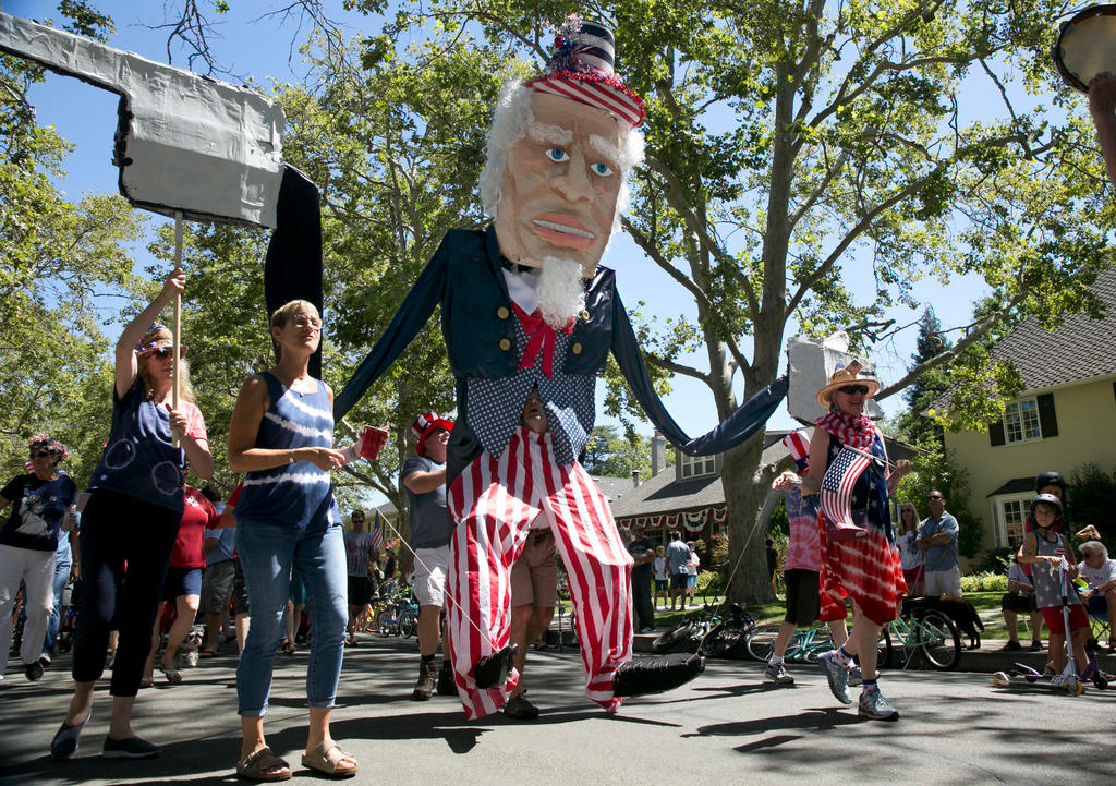 4th of July parade in Sacramento with 15-ft tall Uncle Sam
