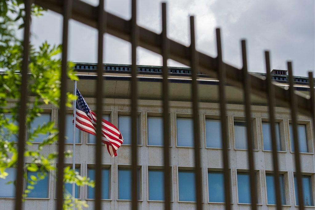 US embassy seen through the bars of the outside gate