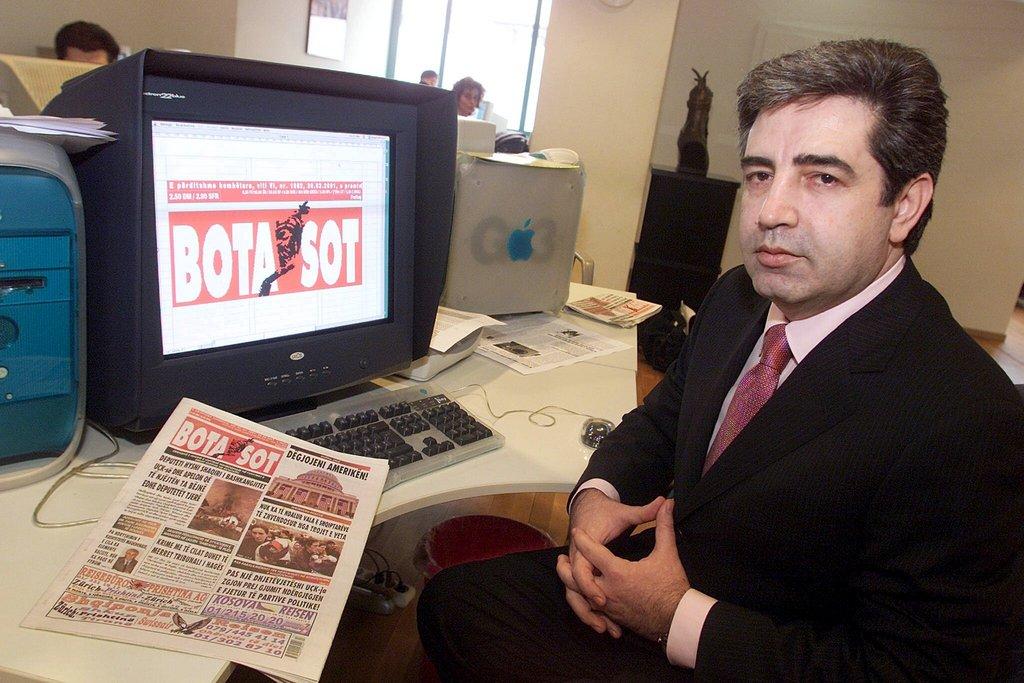 Xhevdet Mazrekj, editor of newspaper Bota Sot, sits in an office