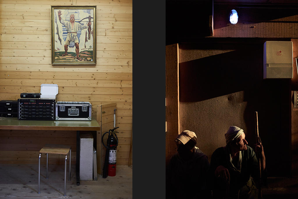 An actor sits near to the backstage sound equipment.