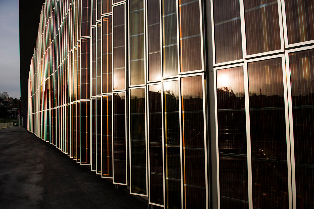 Solar panels on the exterior of the SwissTech Convention Center at EPFL