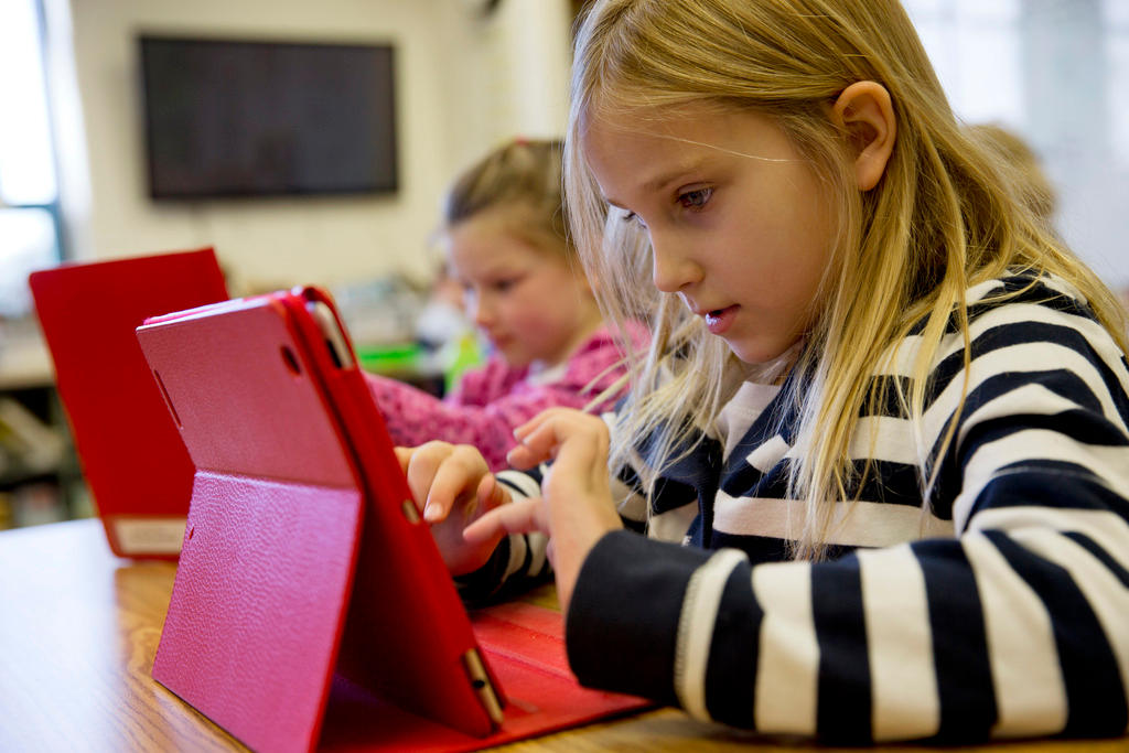 A schoolgirl with her tablet