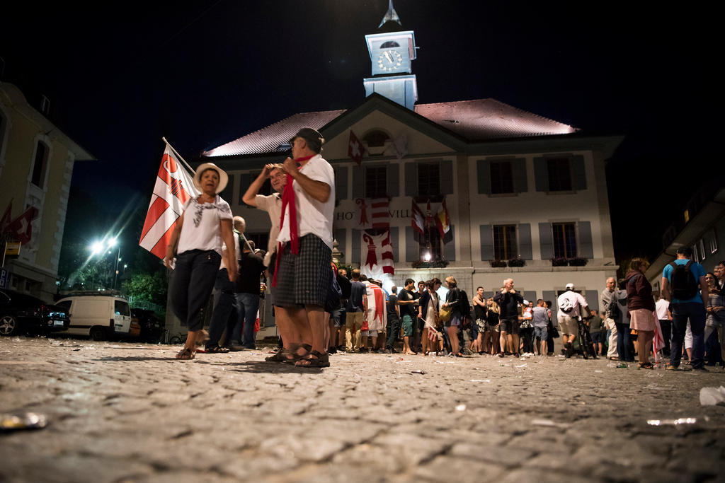 Jura separatists standing in front of Moutier town hall ahead of June 18 vote