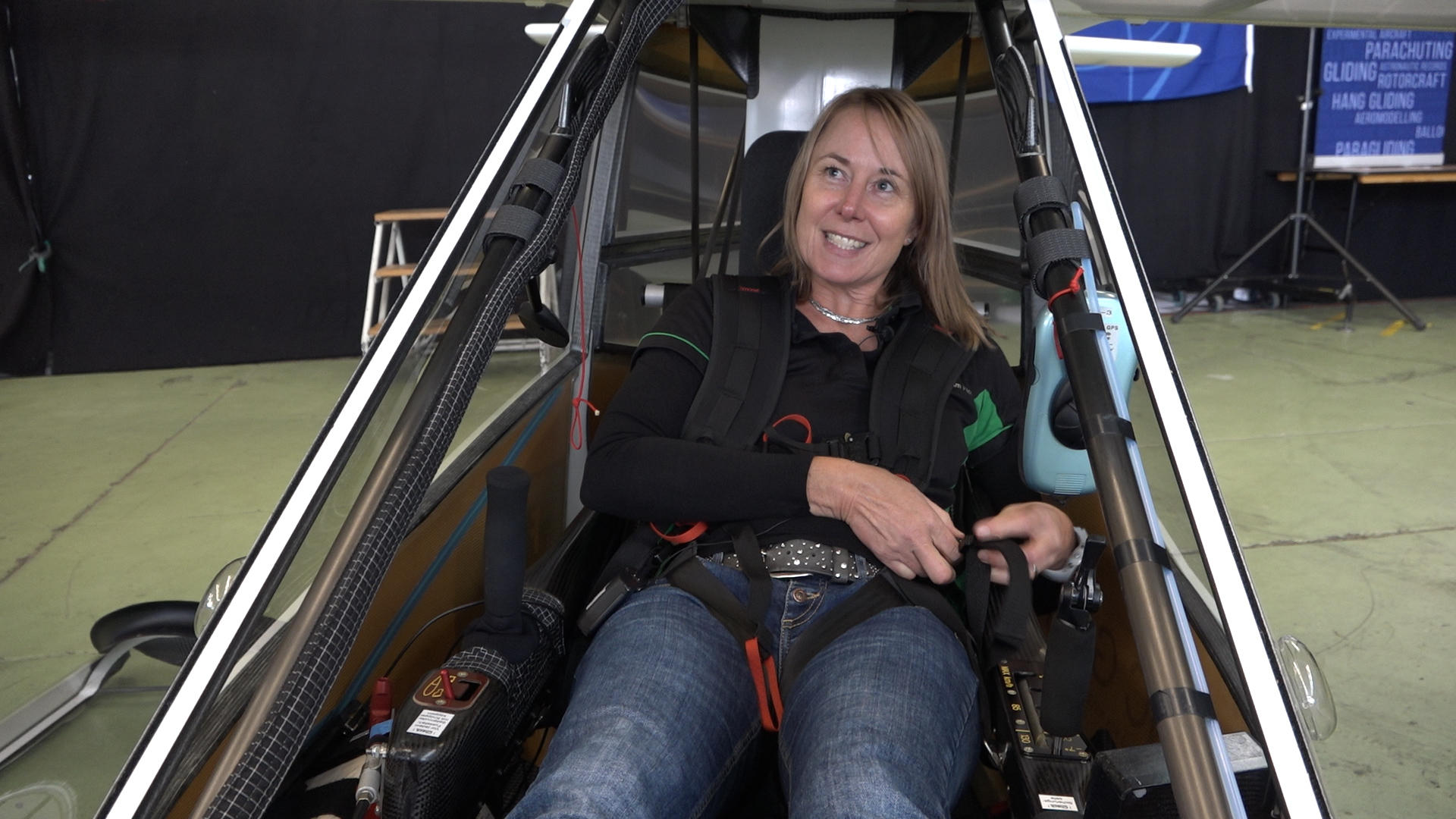 Cornelia Ruppert in cockpit of her plane