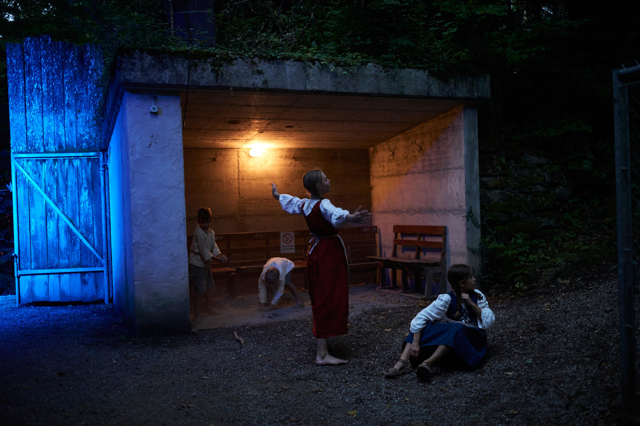 Children playing by a bench