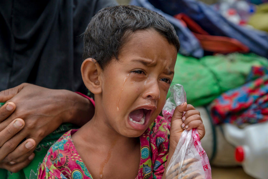 A Rohingya Muslim girl cries