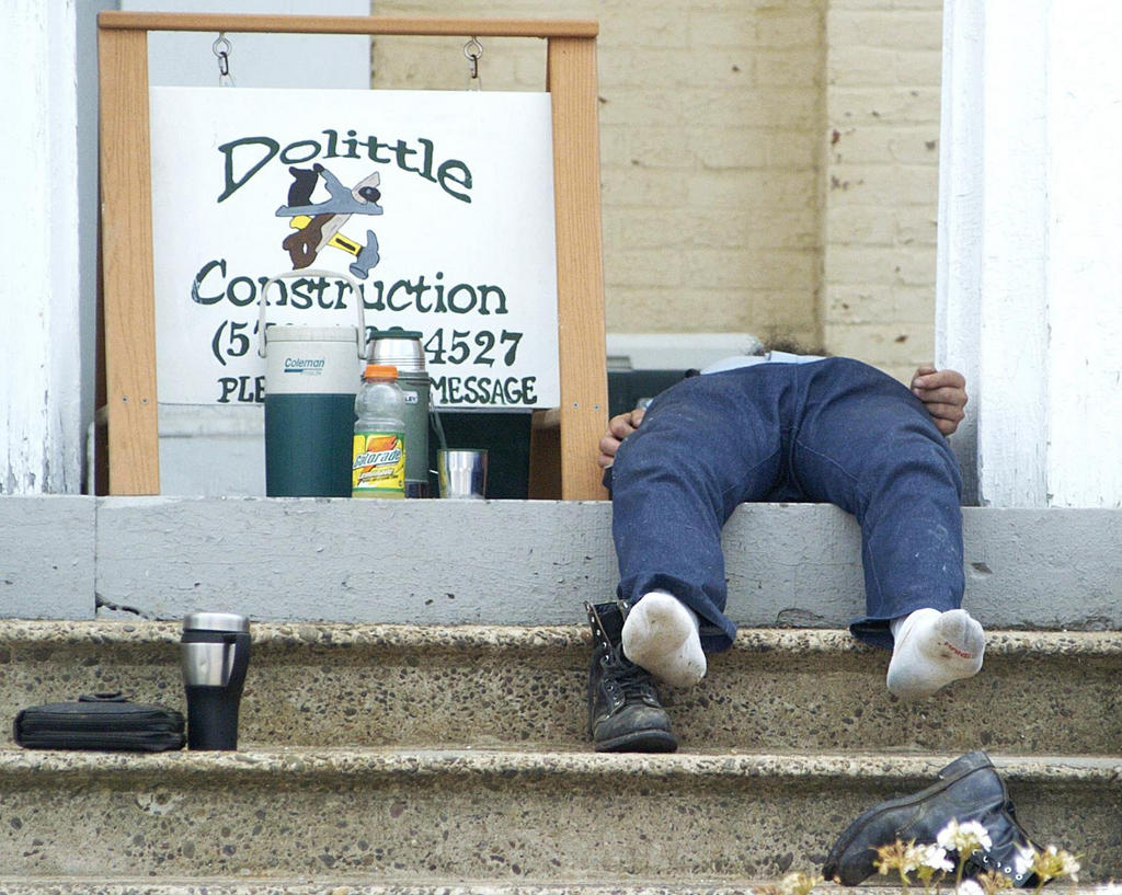 Mennonite taking a break from work in the heat