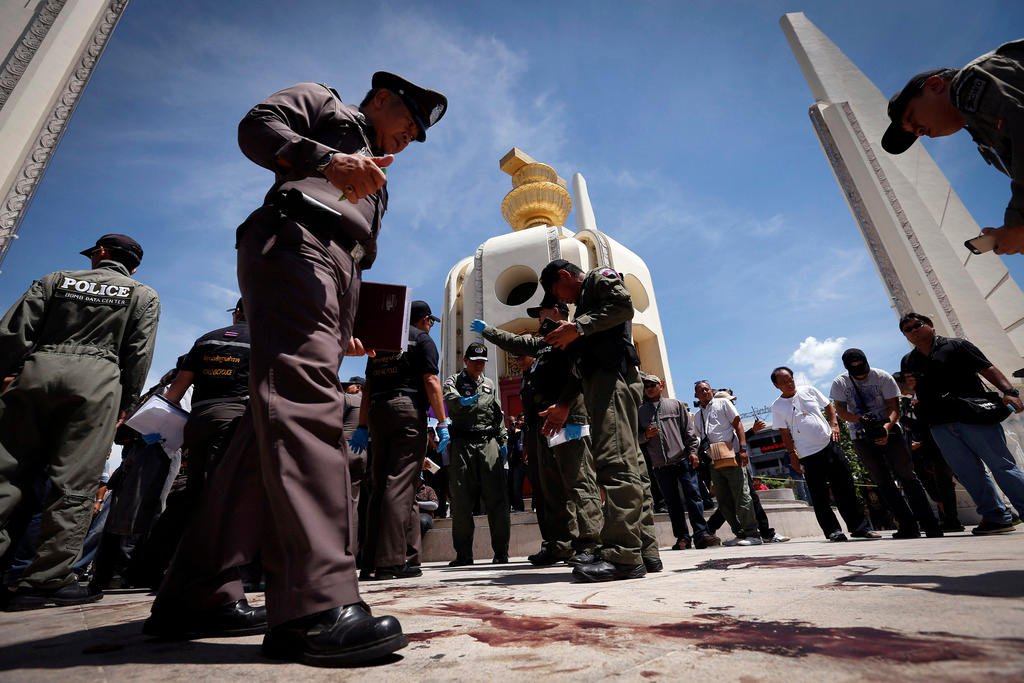 Police standing around the Democracy Momument in Bangkok