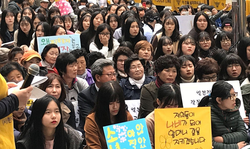 Crowd of silent protesters at a meeting in Cheonggyecheon, South Korea