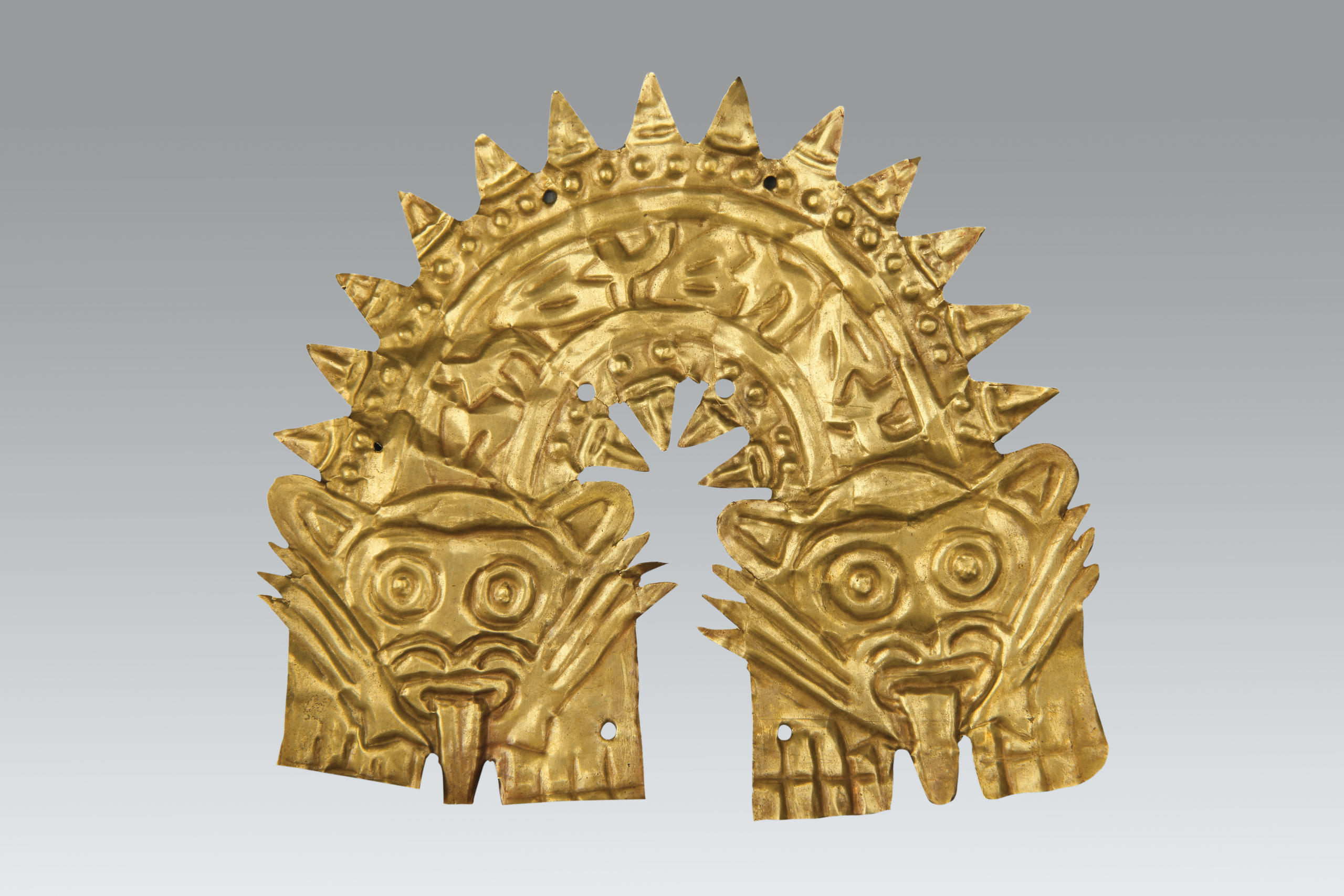 Placa decorativa en oro con forma de serpiente bicéfala