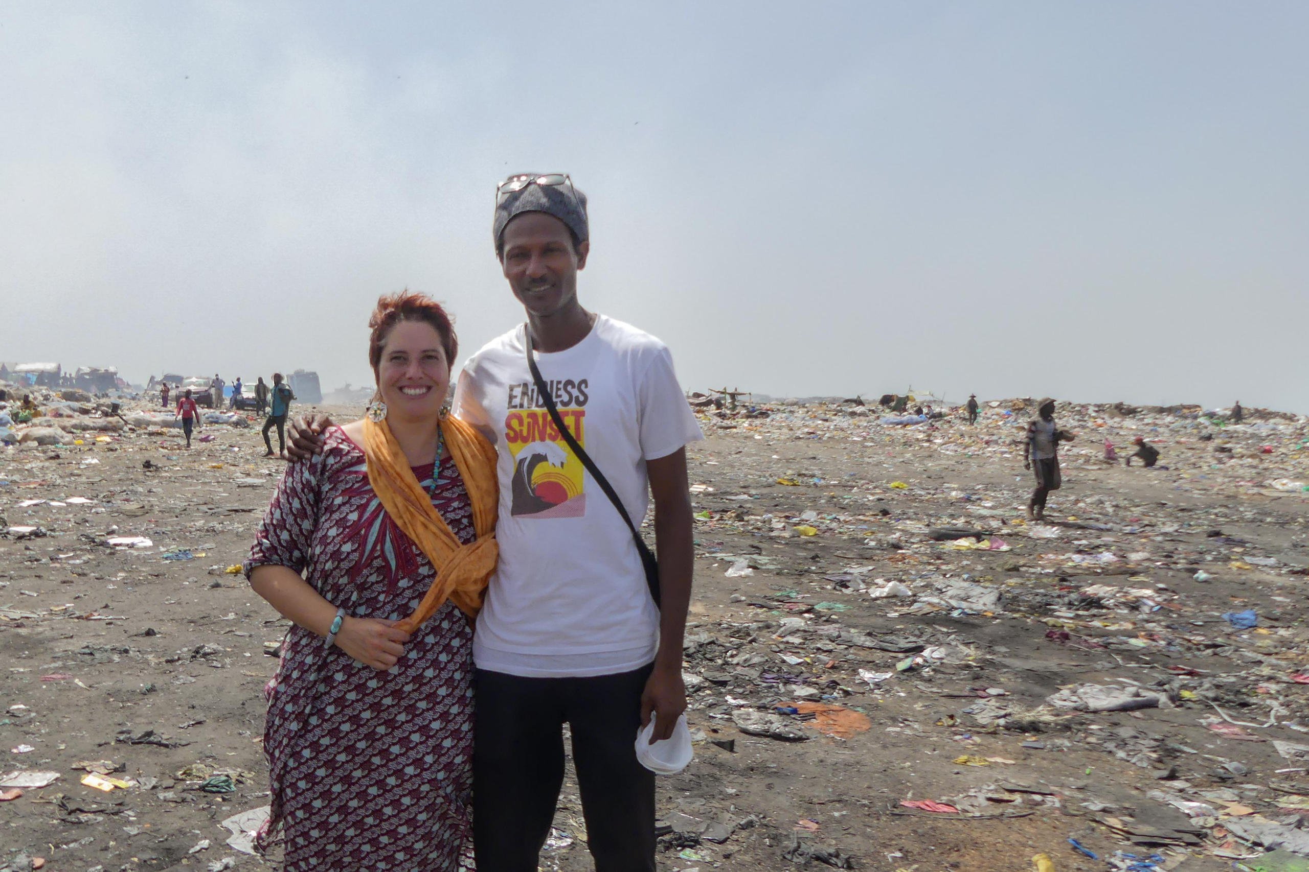 two people at a dump