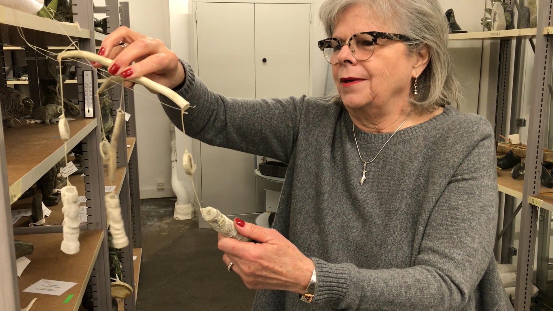 Curator holds up mobile