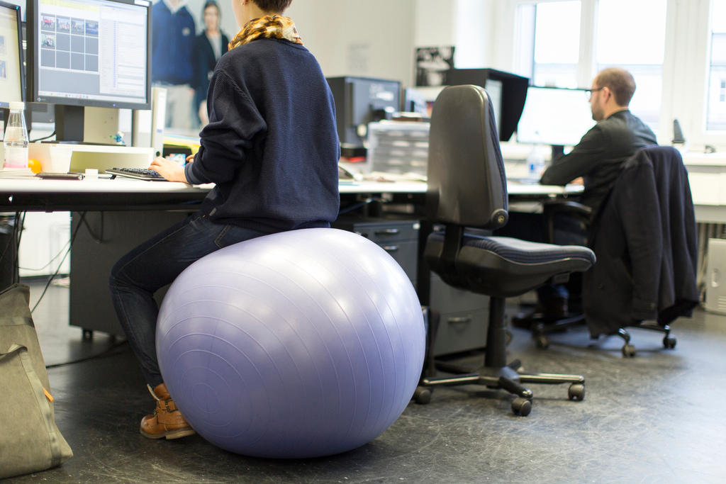 Two people at work in an office