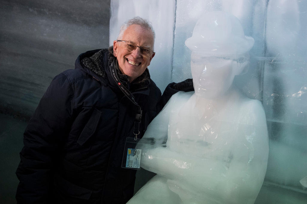 man and ice sculpture
