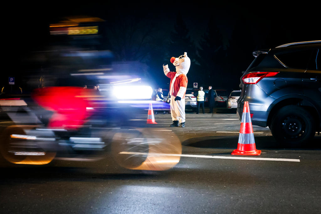 traffic and giant bear mascot