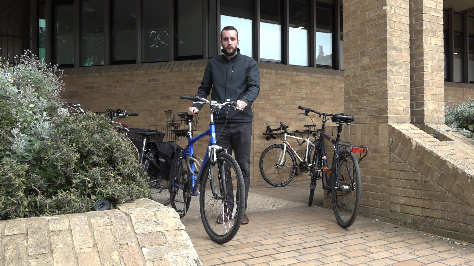 Vincent standing next to bike