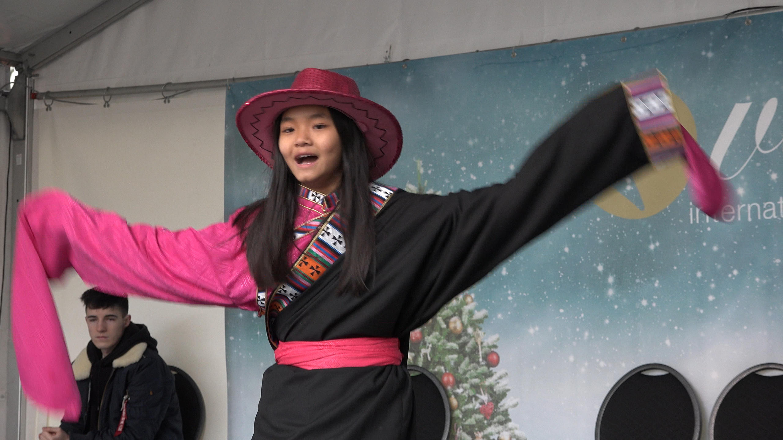 mid shot Tibetan girl dancing