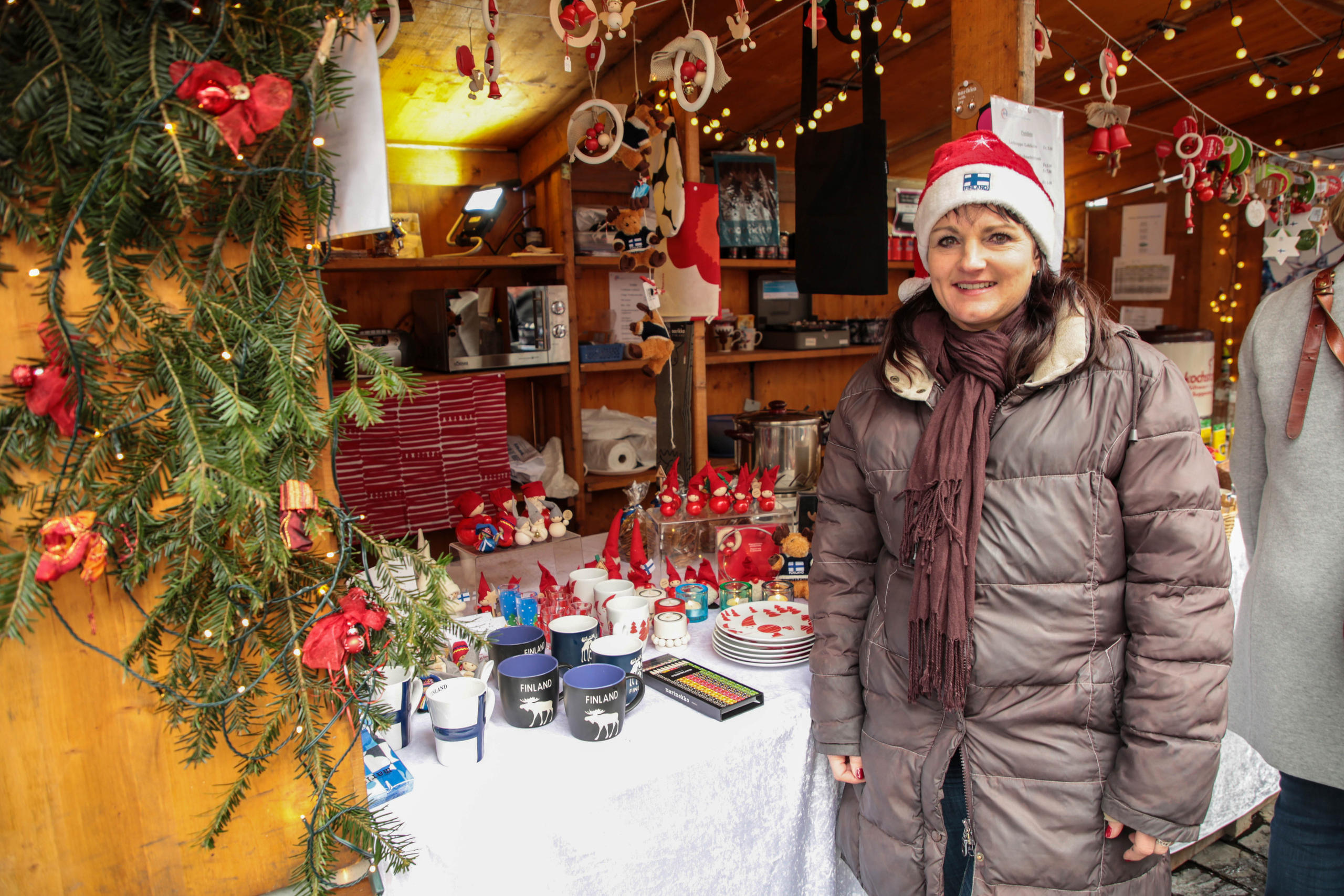 Kristina Manetsch-Mozatti standing at Finnish stall