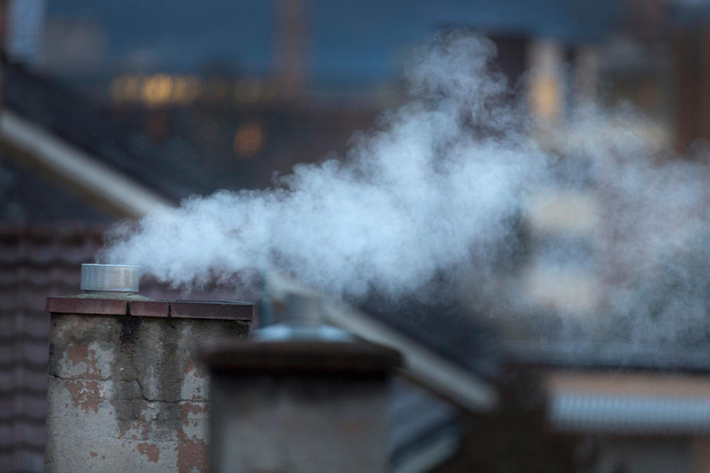 Chimneys spout smoke