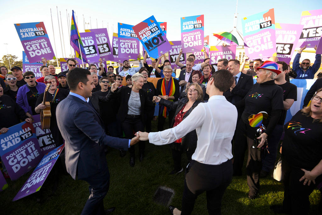 Supporters of gay marriage celebrate its legalisation by Australian parliament on December 7.