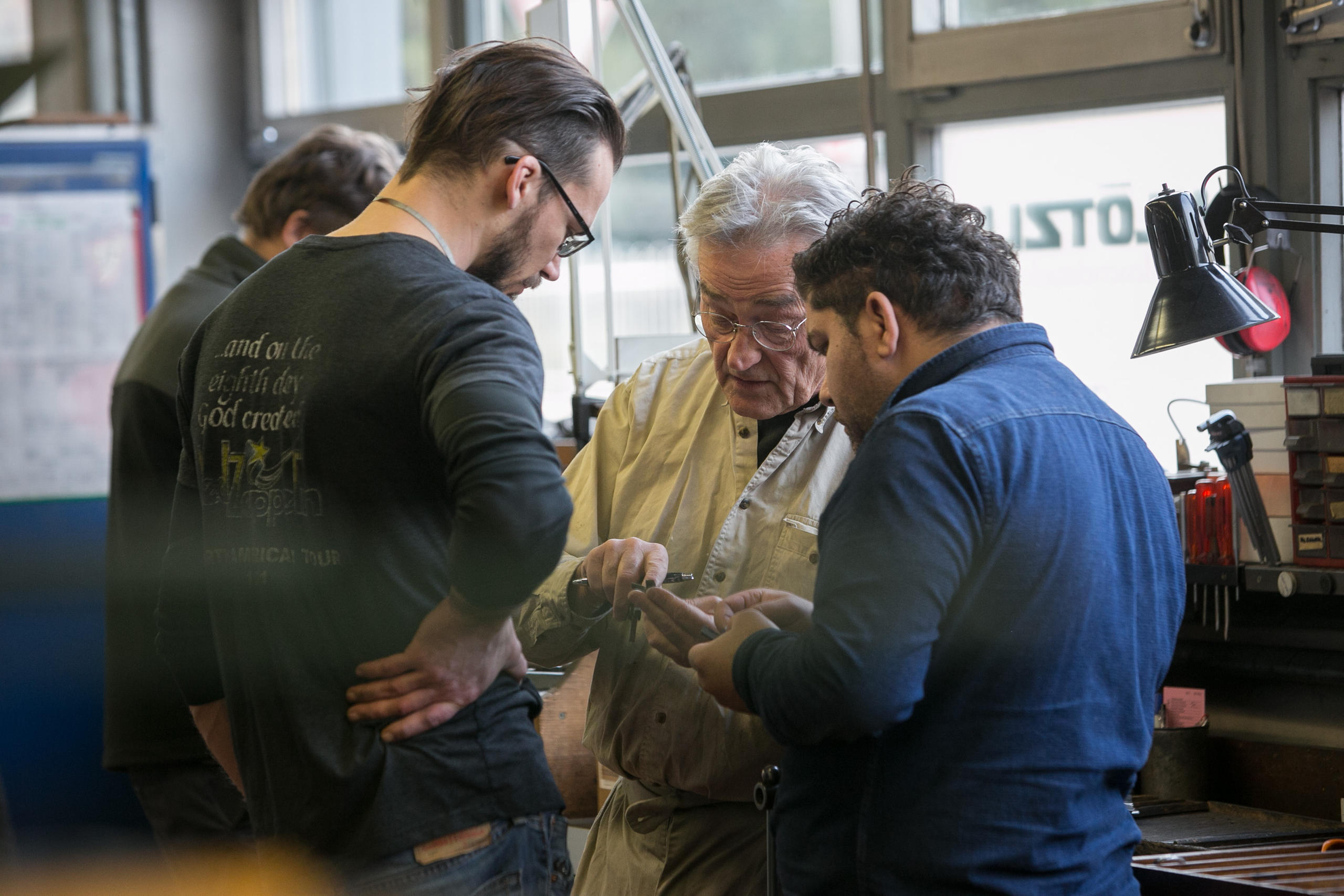 Besprechung in der Werkstatt