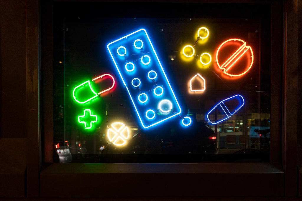 Fluorescent tubes formed into pills and medicines in a shop window