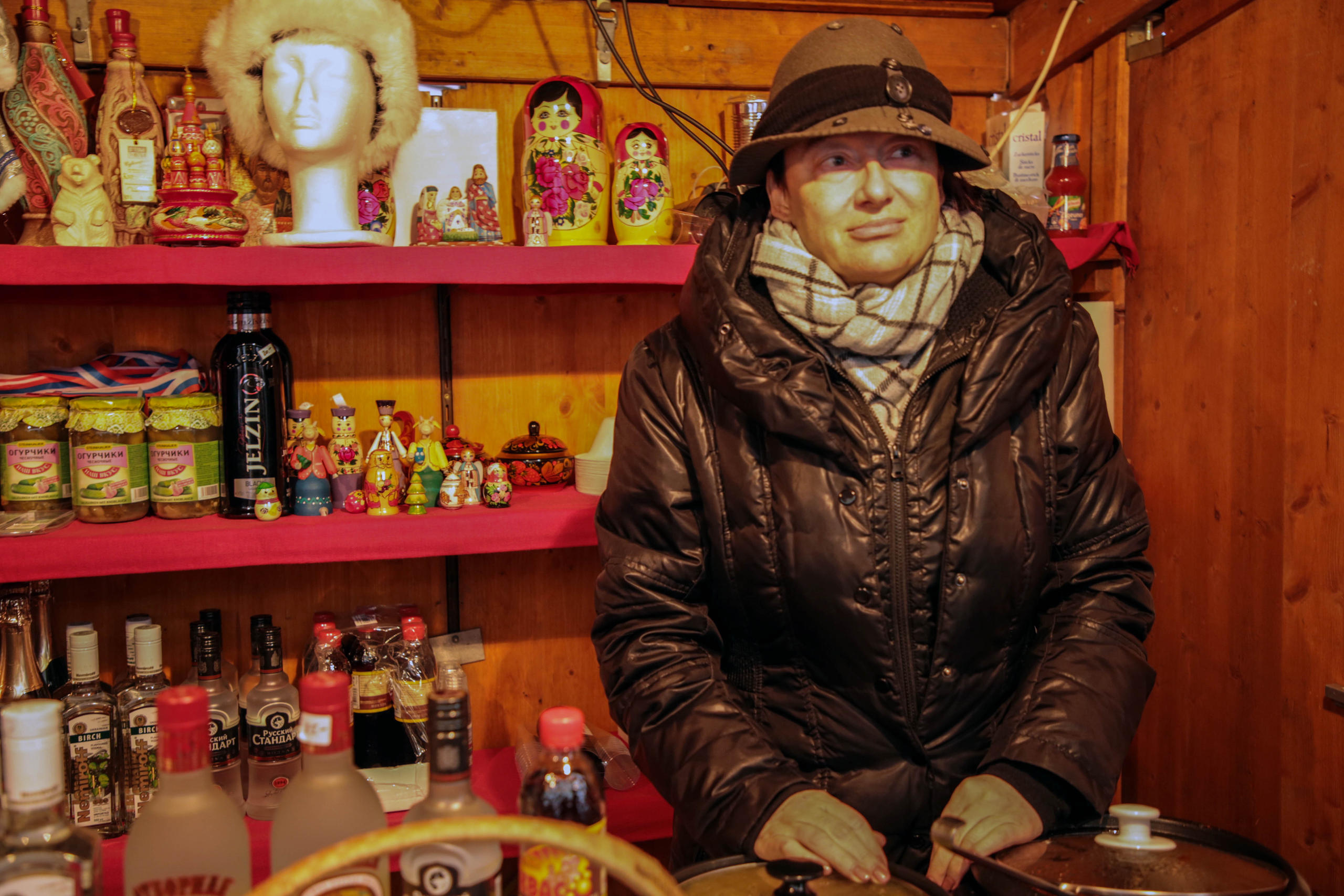 Russian lady and her stall selling Russian products