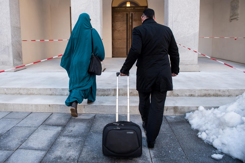 woman arrives for her trial in bellinzona