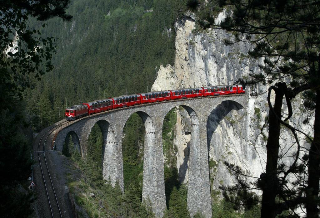 The Rhaetian Railway passes over the Landwasser Viaduct in eastern Switzerland