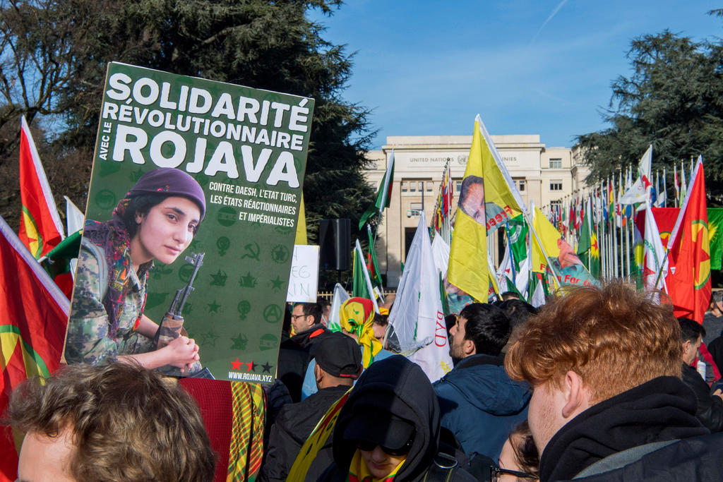 Kurdish demonstrators protest outside the UN headquarters in Geneva on January 24.