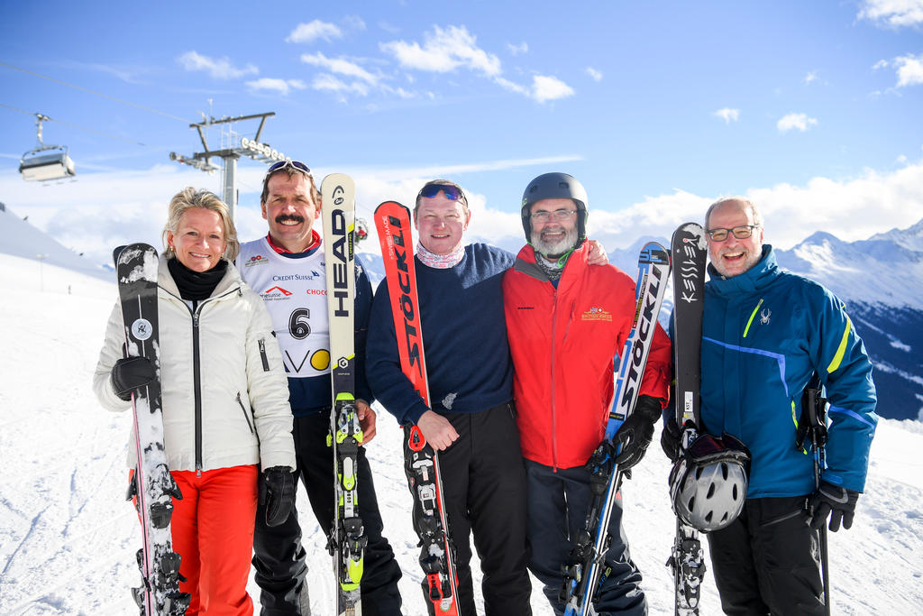 Winners Gmür, far left, and Stahl, second from left, pose in sunny Davos with some of their British counterparts 