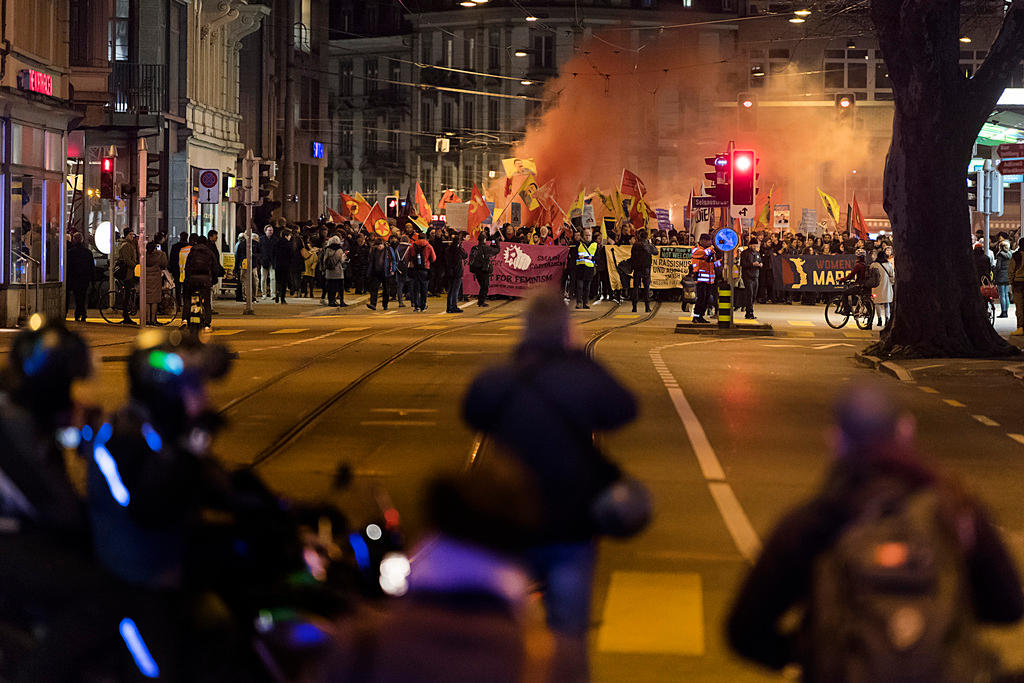 Protesters march in Zurich during the demonstration Trump not welcome!