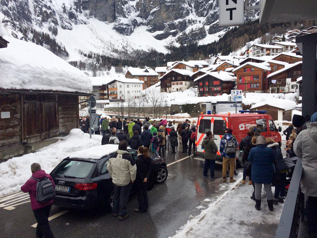 The emergency services evacuate homes at Loeche-les-Bains in canton Valais on January 5, 2018 due to avalanche dangers